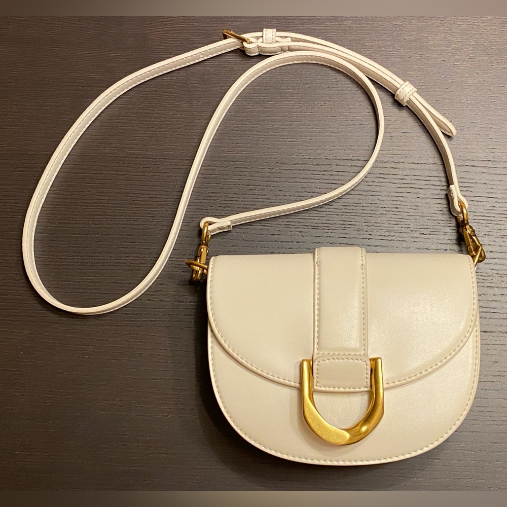 Charles & Keith mini Gabine saddle shoulder crossbody bag purse beige vegan